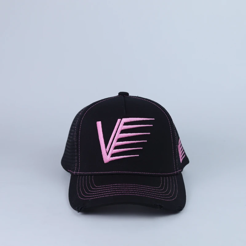 Front of black trucker cap with pink graphic embroidery and matching visor stitching