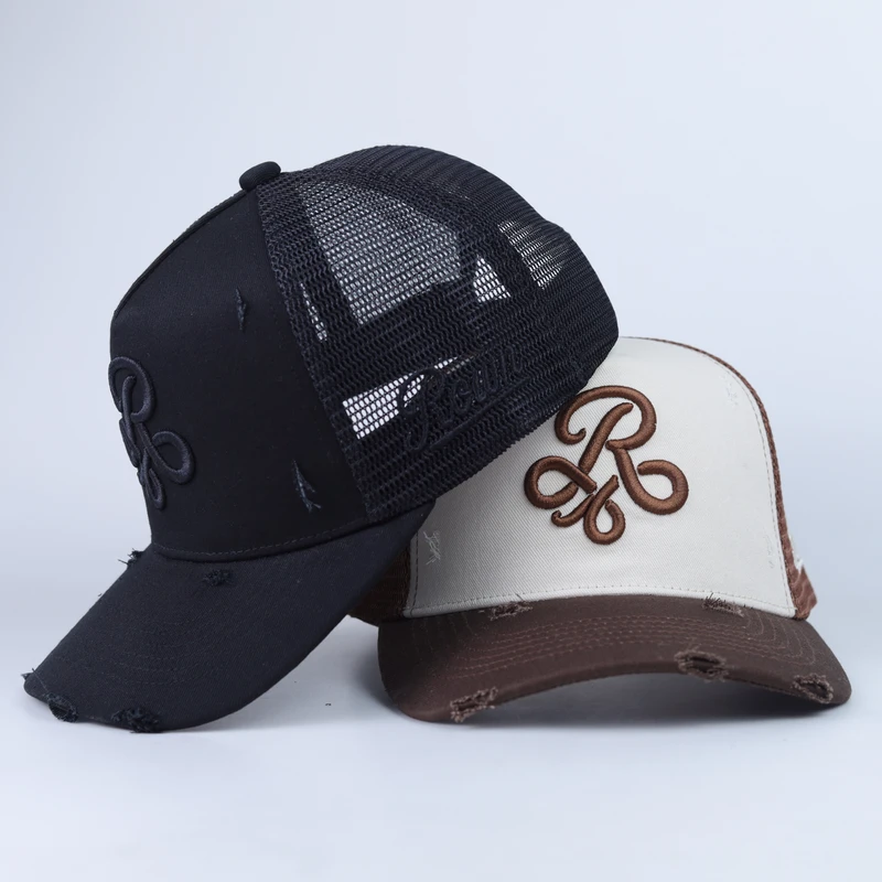 Black tonal and cream brown embroidered distressed mesh trucker caps together