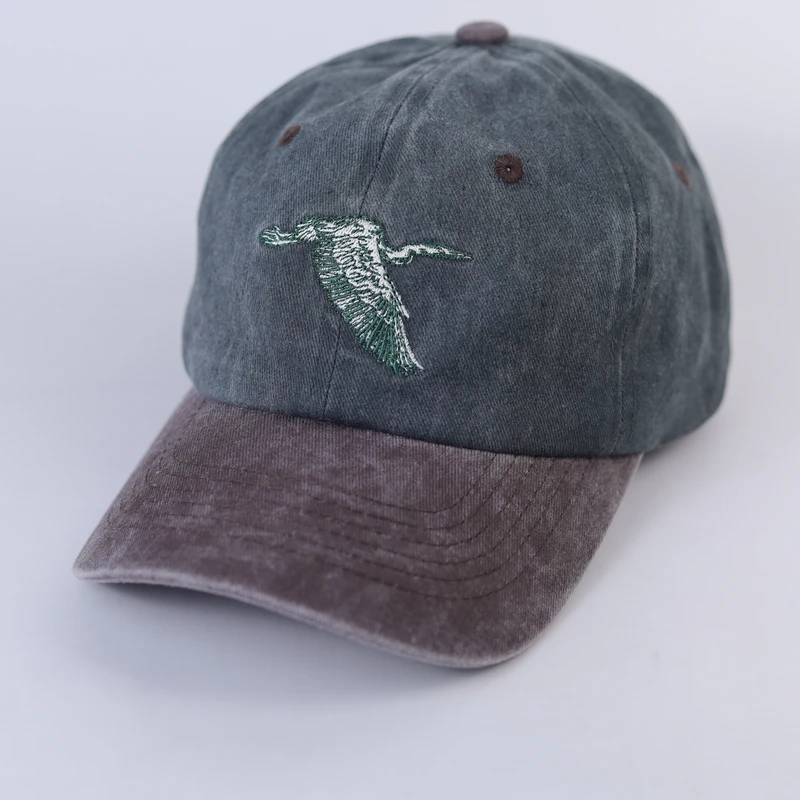 Three-quarter view of green and brown washed cap